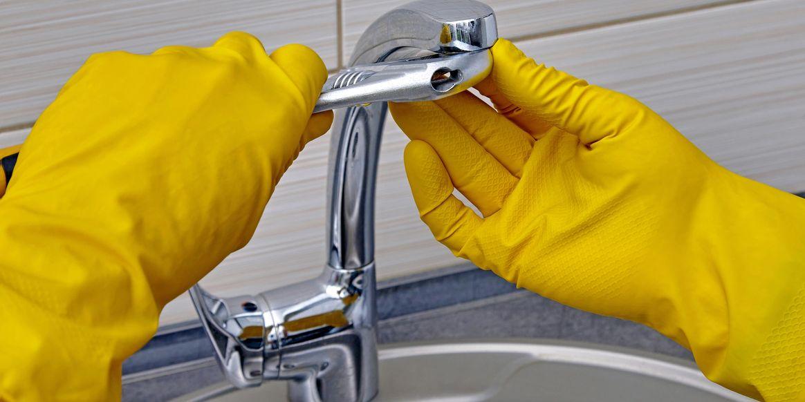 Kitchen faucet repair with professional tools